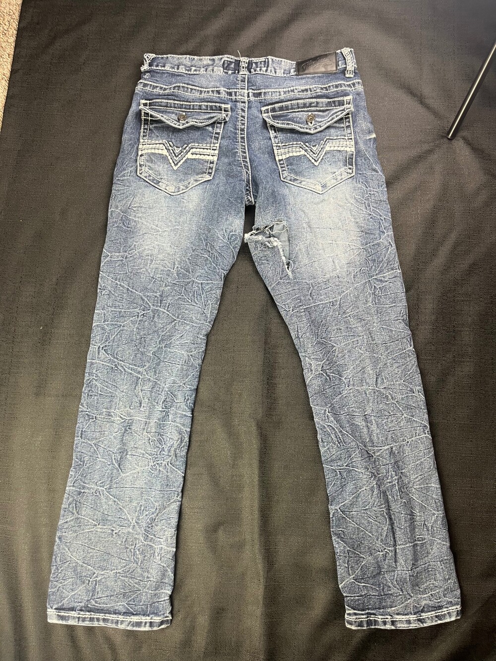 Y2K distressed blue washed denims  men’s Trueluck jeans size 32